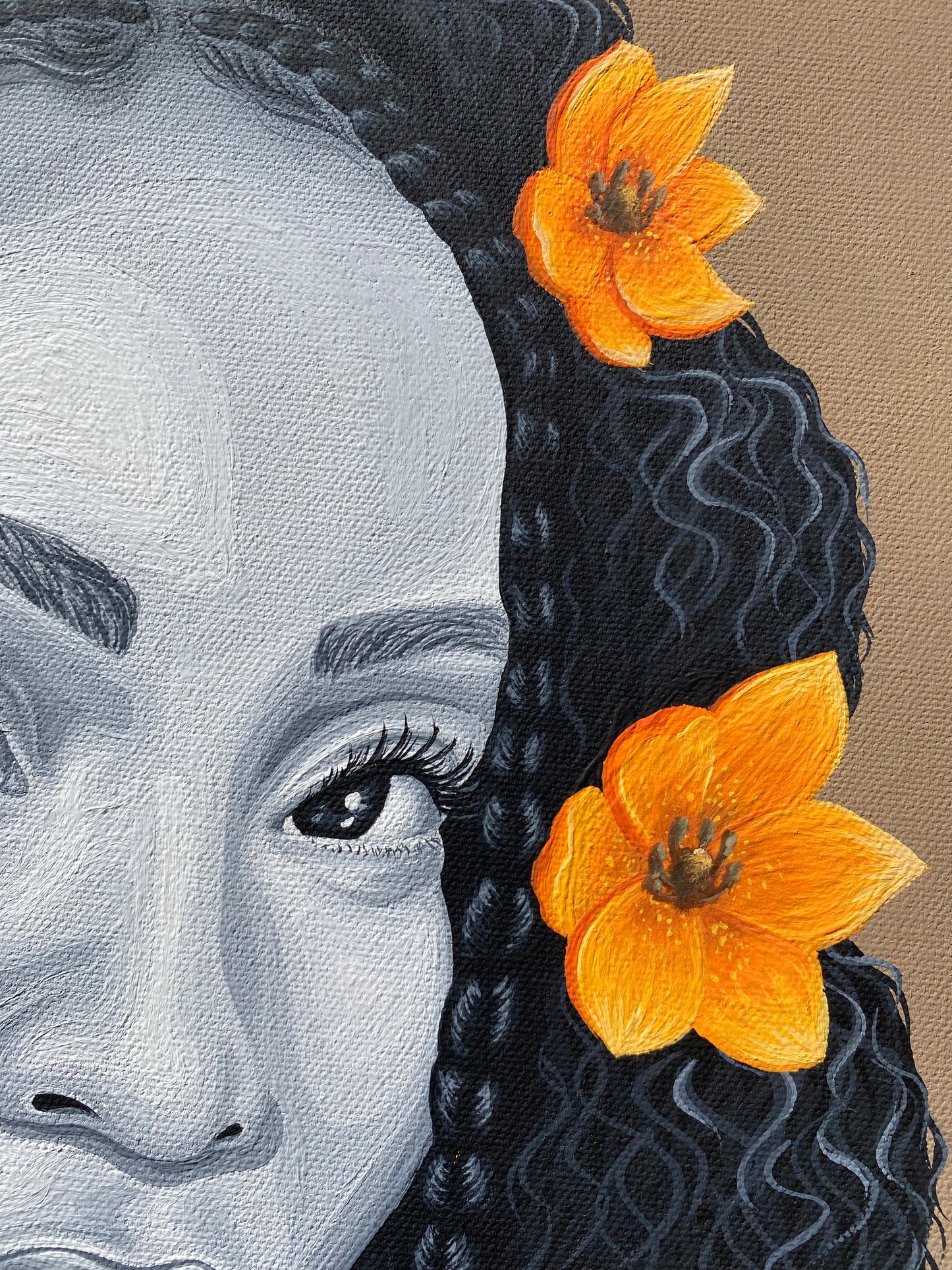 Close-up portrait artwork of a woman's face with dark curly hair adorned by two bright orange flowers, shown against a tan textured background.